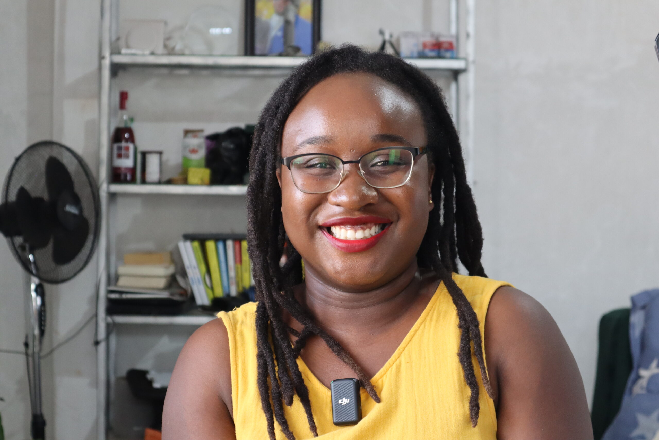 Yvonne Feresu smiling in a yellow top.